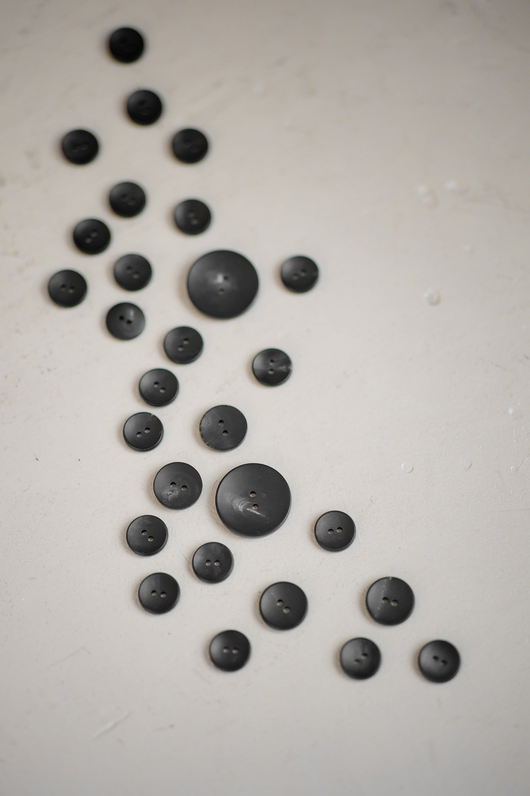 Buttons on a table | Lindsay King Luxury Fashion and Inspired Home Goods